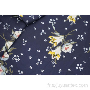 Tissu 100% polyester imprimé crêpe mousse motif lis